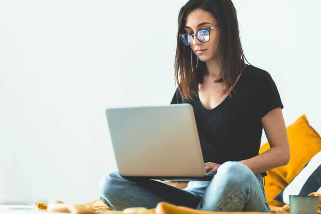 Woman at computer with glasses